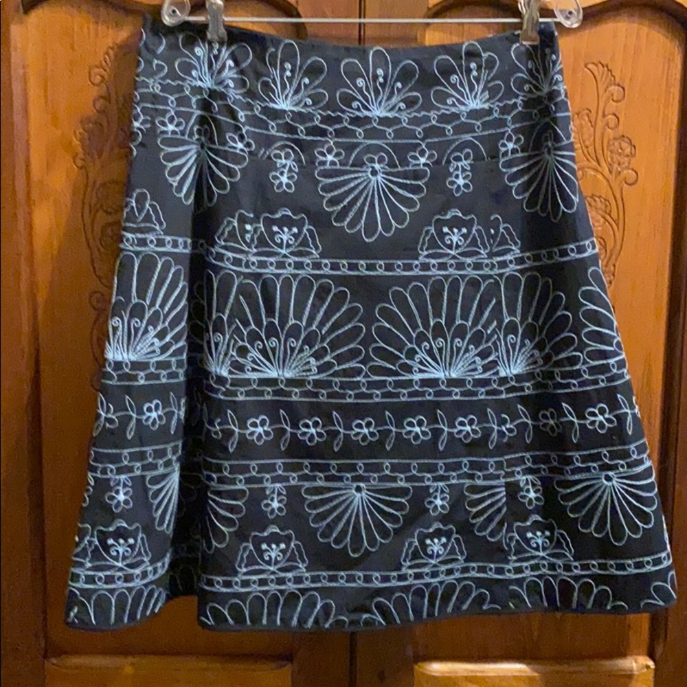 Black flared skirt with white stitching
